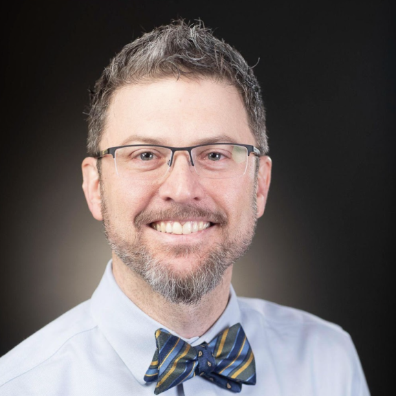 man with blue tie